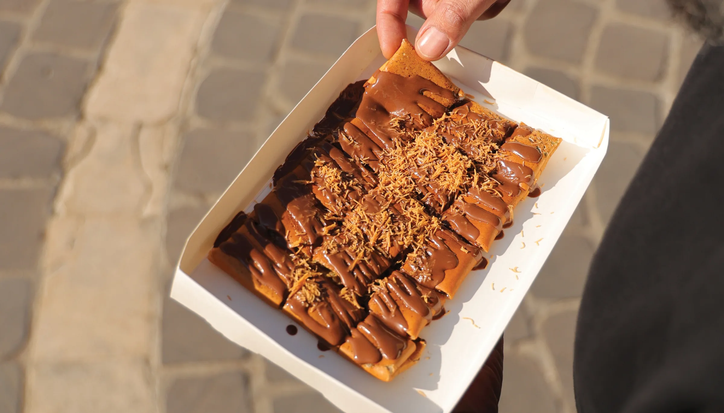 Chocolate waffle topped with crispy kataifi